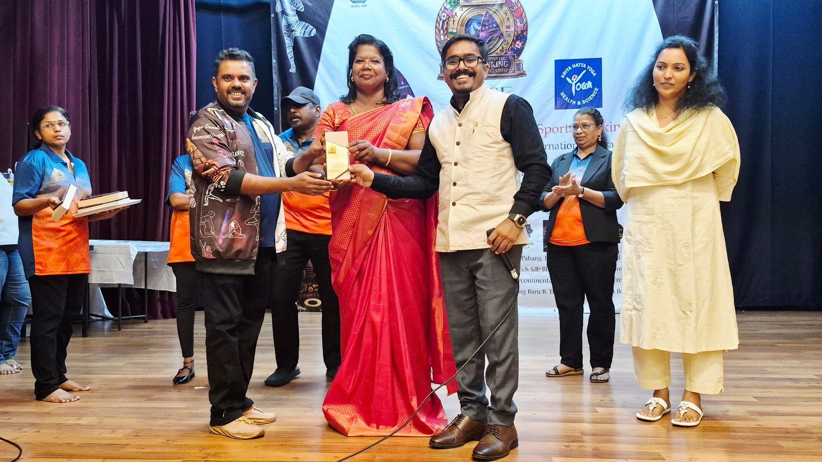 Receiving medal from Indian HC and UYSF President